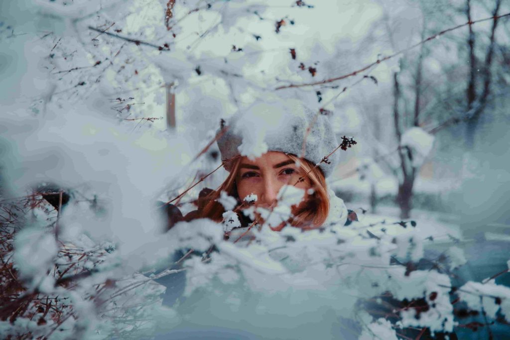 Girl in snow with healthy winter skin