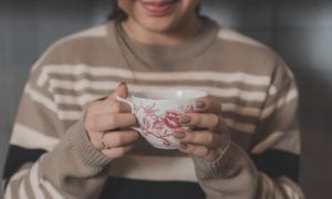 Woman holding a mug of tea