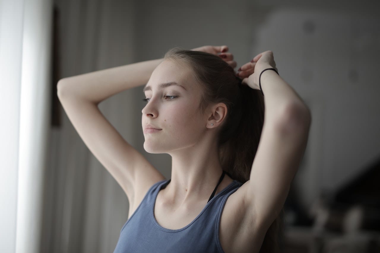 Woman looking out window