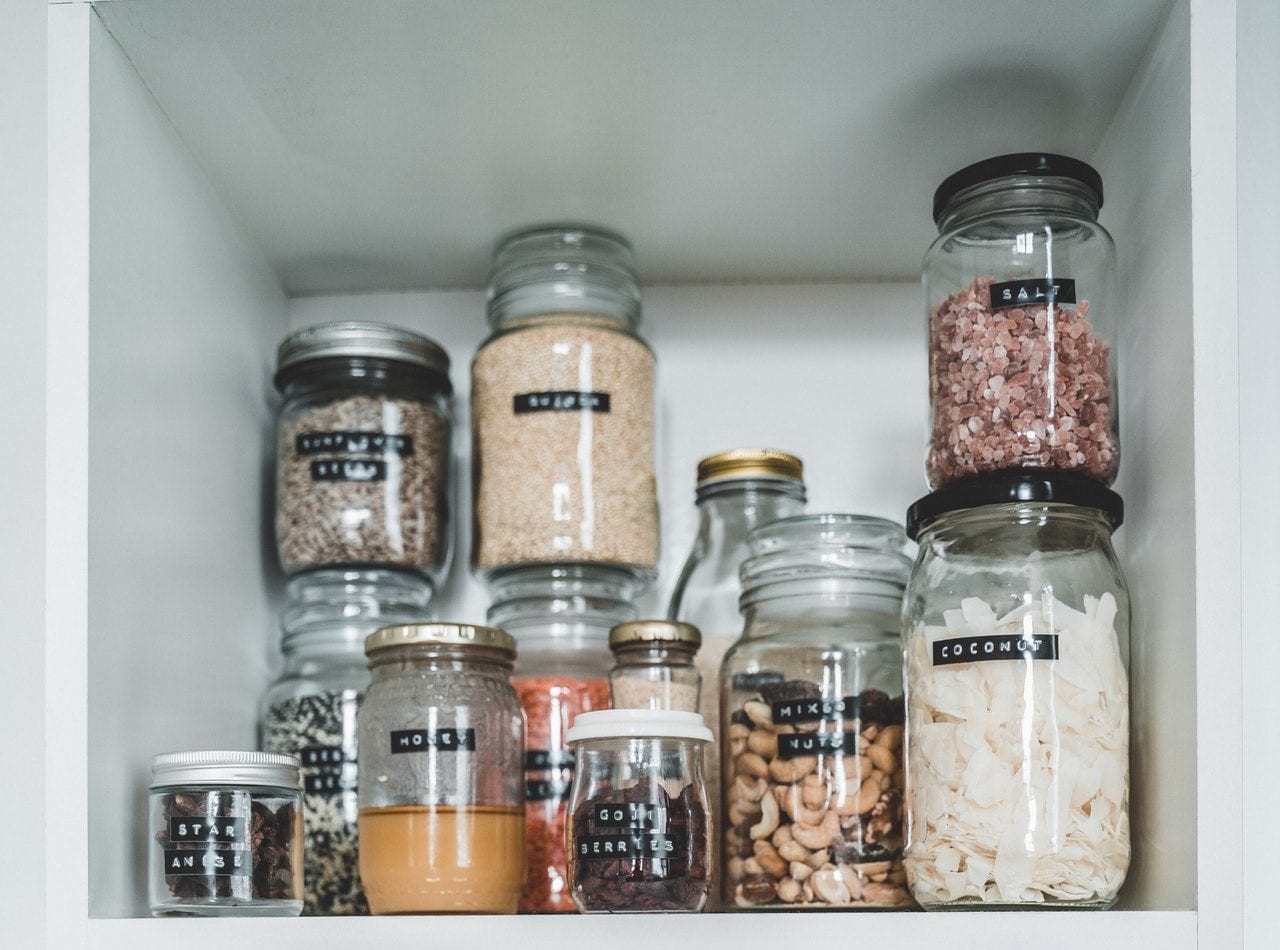 Cupboard of jars of ingredients