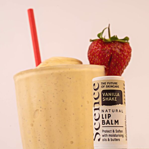 vanilla flavoured natural lip balm with milkshake in the background