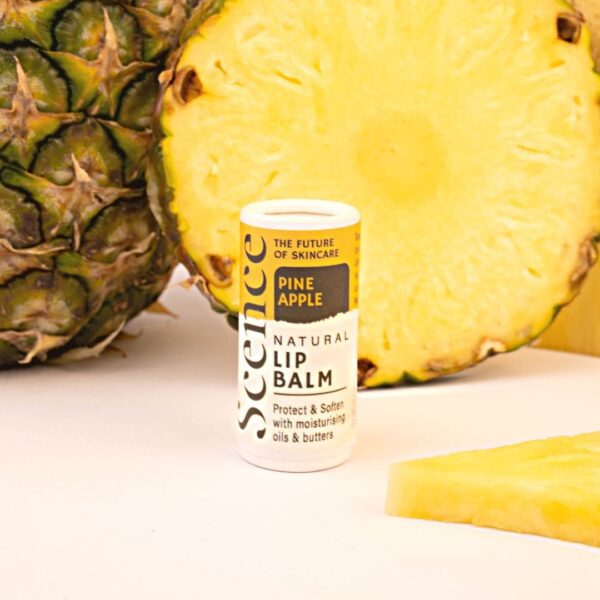 pineapple flavoured natural lip balm with pineapple in the background